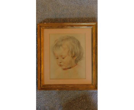 A glazed and framed pencil drawing and highlighted portrait of a young child, signed. 37x33cm 