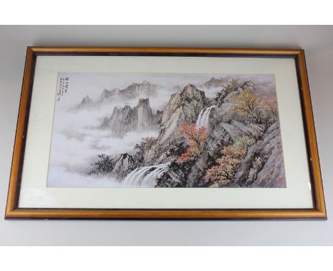 A Japanese print of a mountain landscape, signed, 51.5cm by 28cm
