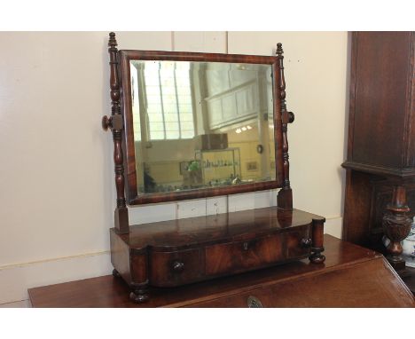 A Victorian mahogany dressing table mirror with adjustable rectangular mirror, on three drawer base and button feet, 58cm