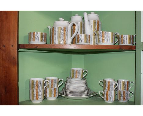 A Midwinter Sienna Staffordshire pottery part tea and coffee service including a teapot and two coffee pots