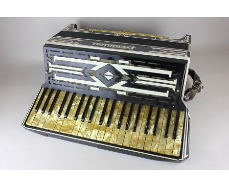 A Frontalini Celeste piano accordion in fitted case