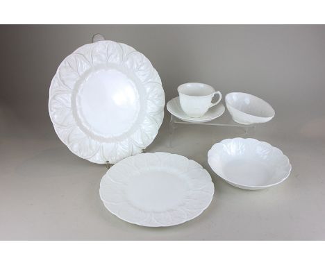 A Wedgwood porcelain countryware cabbage leaf pattern part dinner and tea service in plain white glaze, together with nine Co