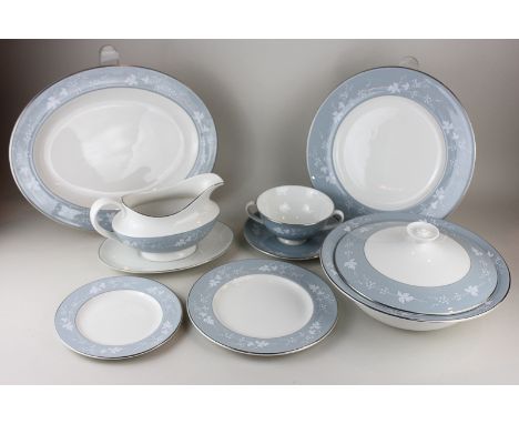 A Royal Doulton Reflection pattern part dinner service including two vegetable tureens, an oval platter, six dinner, dessert 