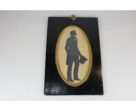 A 19th century alphabet sampler by Sarah Ann Fogden, a silhouette of a Victorian gentleman and a mother of pearl inlaid hardw