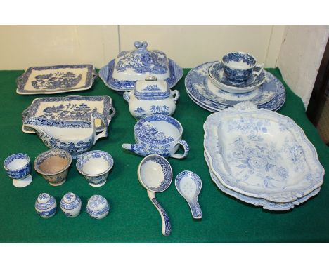 A collection of various English blue and white china including a late Spode feeding cup, a Willow pattern tureen and cover, t