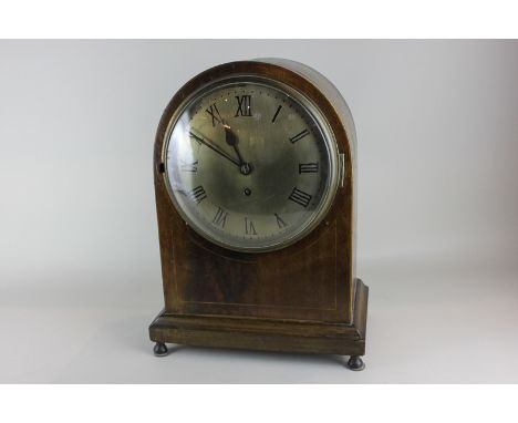 An Edwardian mahogany cased mantel clock, the movement marked Coventry, in domed case, the bronzed dial with hand painted Rom