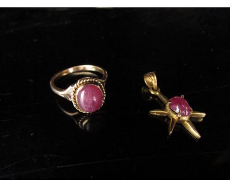 A gold ring with cabochon ruby in rope setting, unmarked. Size O, 3.9g and a cabochon ruby pendant, unmarked, 1.5g 