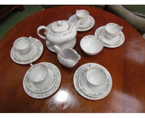 A part tea/coffee service comprising of teapot, milk jug, sugar bowls, coffee pot, tea and coffee cups, saucers and side plat