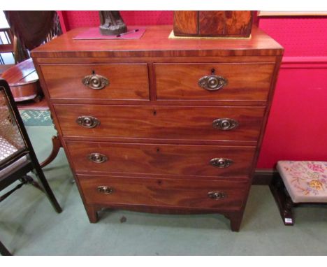 Circa 1840 a mahogany and black line inlay caddy top chest of two short over three graduating long drawers on bracket feet, 1