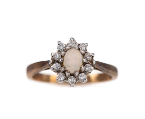 OPAL AND DIAMOND CLUSTER RING, set with an oval opal within a halo of round brilliant cut diamonds totalling approximately 0.