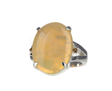 OPAL RING, set with an oval opal of approximately 12.00 carats, marked 925, size Q 1/2, 8.1g