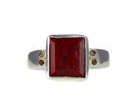 RUBY RING, set with a step cut ruby of approximately 4.00 carats, in silver, size O 1/2, 8.6g