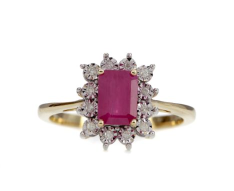 RUBY AND DIAMOND RING, the emerald cut ruby of approximately 1.40 carats, within an illusion set diamond halo, the diamonds t