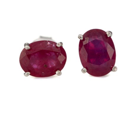 PAIR OF TREATED RUBY EARRINGS, set with oval treated rubies, in silver, 1.7g