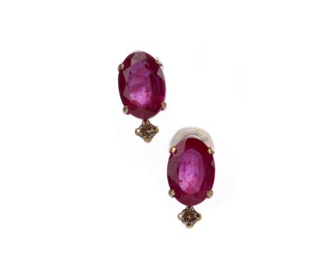 PAIR OF TREATED RUBY AND DIAMOND EARRINGS, set with oval treated rubies and round brilliant cut diamonds totalling approximat