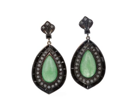 PAIR OF JADE, ONYX AND DIAMOND EARRINGS, set with a pear shaped cabochon jade within a double halo of round brilliant cut dia