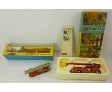 A CORGI SIMON SNORKEL FIRE ENGINE 1127 with instructions (no fireman), boxed, and a GERMAN MAGIRUS LADDER FIRE ENGINE, and a 