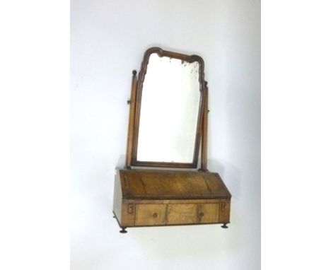 A PART 18TH CENTURY AND LATER QUEEN ANNE STYLE TOILET MIRROR, having shaped rectangular fancy bevel plate, squared horns, upo