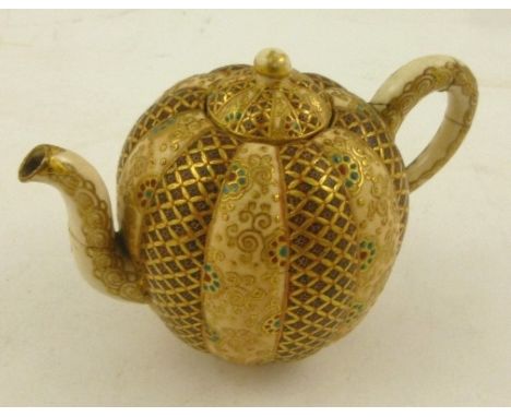 A LATE 19TH CENTURY JAPANESE SATSUMA CREAM GLAZED EARTHENWARE SMALL LOBED GLOBULAR POT, having alternate panels of lattice an