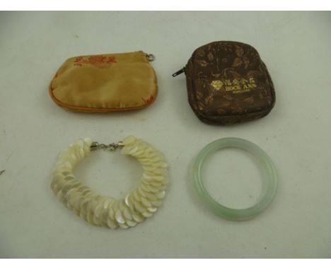A JADE BANGLE, and a mother-of-pearl fish scale pattern multi-laid BRACELET 