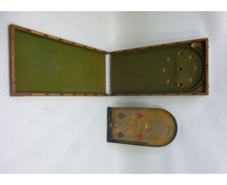 A VICTORIAN MAHOGANY "HIT A PIN" BRIDGE BAGATELLE BOARD of traditional fold-over design, manufactured by John Jaques and Son 