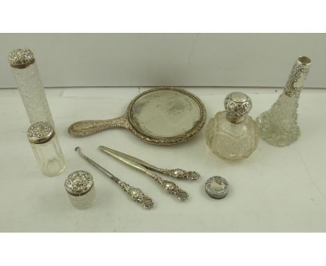 MIXED MAKERS A MATCHED SUITE OF SILVER MOUNTED DRESSING TABLE ITEMS, comprising a hand mirror, scent bottle, paste pot, a lid