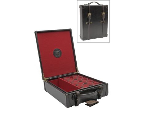 REY PAVON A NEW AND UNUSED LEATHER CASED WISKERA SET WITH TEN SHOT GLASSES, with provision for a bottle of spirits, set in a 