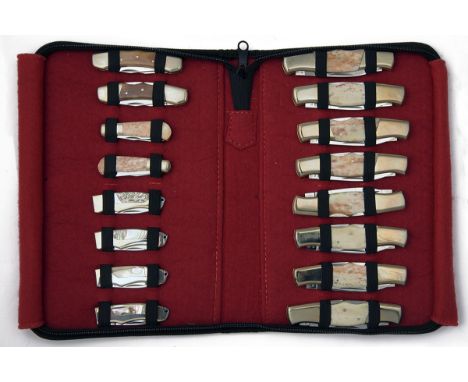 THREE COLLECTOR'S CORDURA CASES CONTAINING 48 POCKET FOLDING AND LOCK KNIVES, assorted repeated designs and scale materials, 