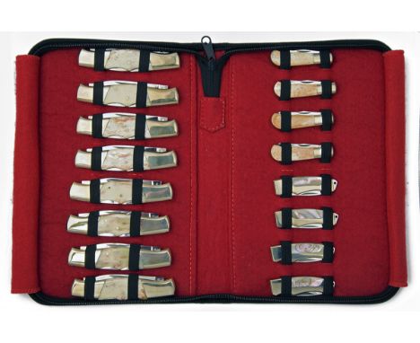 THREE COLLECTOR'S CORDURA CASES CONTAINING 48 POCKET FOLDING AND LOCK KNIVES, assorted repeated designs and scale materials, 