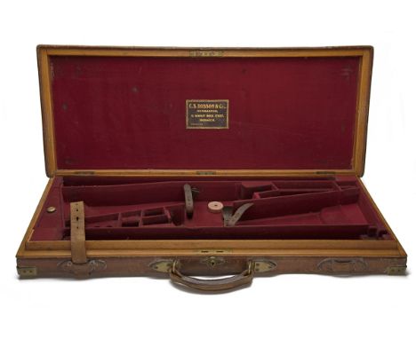 A BRASS-CORNERED OAK AND LEATHER DOUBLE GUNCASE, fitted for 28in. barrels (could adapt to 30in.), the interior lined with red
