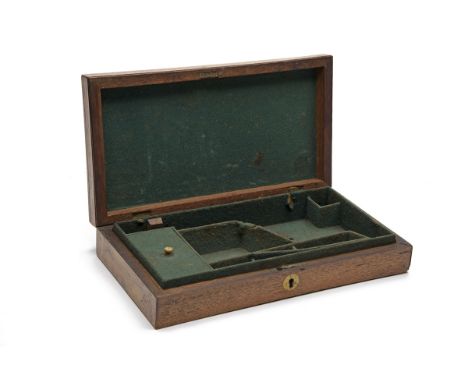 AN ENGLISH OAK STORAGE CASE FOR A REVOLVER, UNSIGNED, third quarter of the 19th century and possibly for a pinfire, internal 
