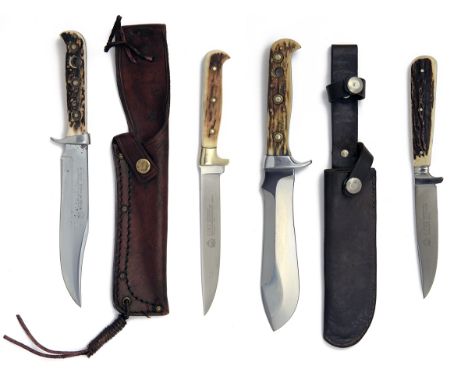 PUMA, SOLINGEN A COLLECTION OF FOUR SHEATH-KNIVES, SOME BOXED, including a boxed model 'WILDTOTER', serial no. 41582, with 5 