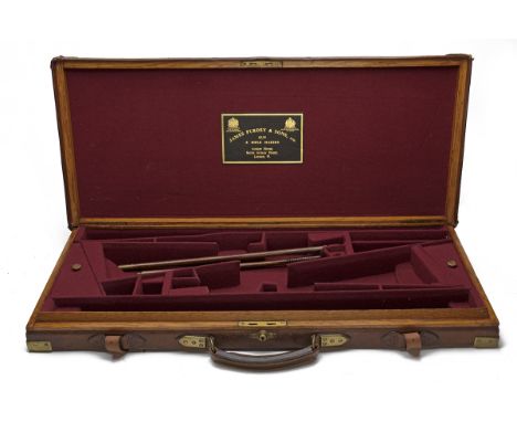 JAMES PURDEY &amp; SONS LTD. A BRASS-CORNERED OAK AND LEATHER DOUBLE GUNCASE, fitted for 30in. barrels, the interior lined wi