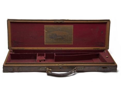 JOHN DICKSON &amp; SON A BRASS-CORNERED OAK AND LEATHER SINGLE HAMMERGUN CASE, fitted for 30in. barrels, the interior lined w