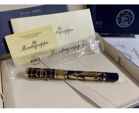 A 2002 euro Montegrappa 18k gold and blue enamel roller ball Ben with box and papers. The map of Europe accent around the pen