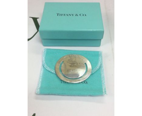 A boxed Tiffany silver money clip. Shipping category A.