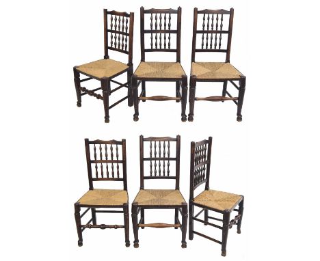 Harlequin set of six rush seat oak dining chairs,&nbsp;(3 and 3) with ladder back, raised upon turned front legs united by tu