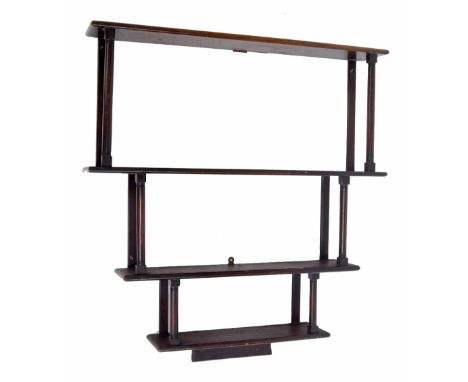 Mahogany tiered open wall shelf,&nbsp;graduated upon turned supports, 30" wide, 5" deep, 32" high 