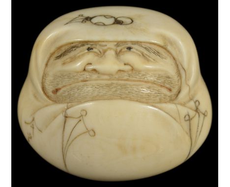 ˜A JAPANESE IVORY NETSUKE OF A DARUMA HAND WARMER, TAISHO PERIOD, CIRCA 1920 with a resigned expression, his hossu engraved t