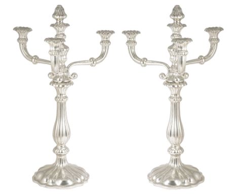 A PAIR OF AUSTRIAN SILVER FOUR-LIGHT CANDELABRA, JOSEF WEININGER, VIENNA, 1855 fluted circular bases rising to similar balust