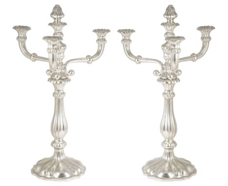 A PAIR OF AUSTRIAN SILVER FOUR-LIGHT CANDELABRA, JOSEF WEININGER, VIENNA, 1855 fluted circular bases rising to similar balust