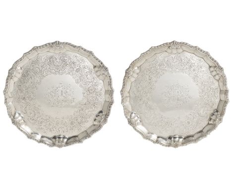 A PAIR OF GEORGE II SILVER SALVERS, ELIZA GODFREY, LONDON, 1755 shaped circular, the centres each engraved with a contemporar