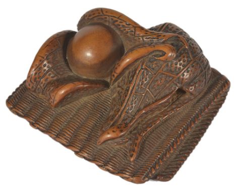 A JAPANESE WOOD NETSUKE OF HOZUKI (PHYSALIS) ON A MAT, LATE EDO PERIOD, CIRCA 1850 two fruit on a folded straw mat, unsigned 
