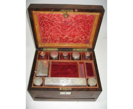 ˜A VICTORIAN ROSEWOOD DRESSING CASE (OR TOILET BOX), J.J. MECHI, LONDON, CIRCA 1845 oblong, fitted with seven silver topped g