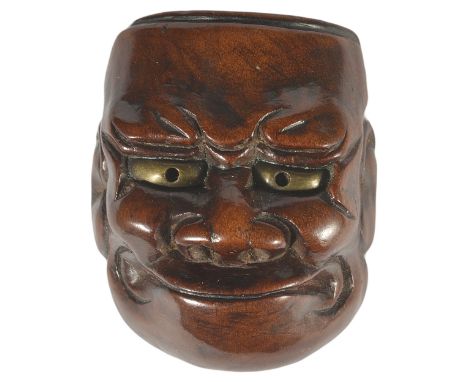 A JAPANESE WOOD MASK NETSUKE OF BESHIMI, LATE EDO PERIOD, CIRCA 1820 the eyes inset with gilt copper, signed Deme Uman tenka 
