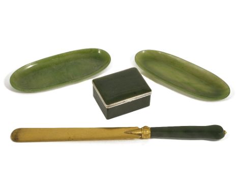 A GROUP OF NEPHRITE DESK ITEMS, EARLY 20TH CENTURY comprising: an oblong box with lightly domed lid and silver hinge mounts w