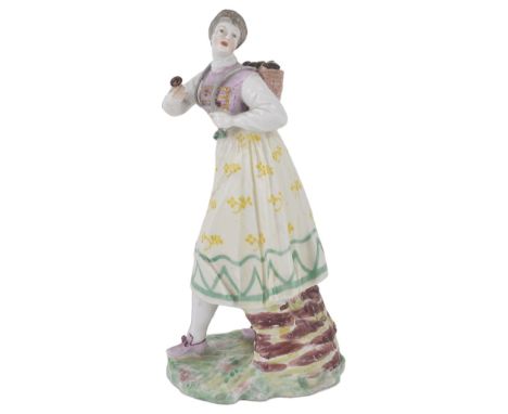 A NYMPENBURG FIGURE OF A MUSHROOM SELLER, CIRCA 1765 modelled by Franz Anton Bustelli (1723-1763), the painting probably slig