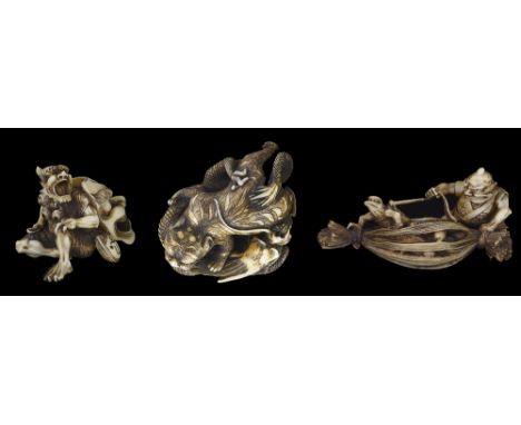 ˜A GROUP OF THREE JAPANESE IVORY NETSUKE, MEIJI PERIOD (1868-1912) comprising: a study of a tiger and dragon, sinking its tee