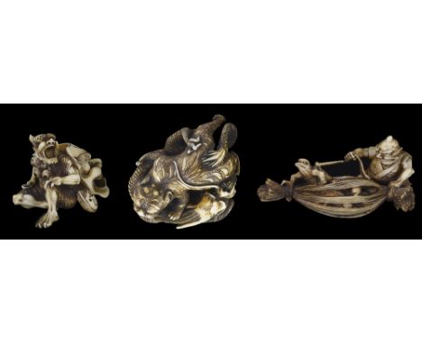 ˜A GROUP OF THREE JAPANESE IVORY NETSUKE, MEIJI PERIOD (1868-1912) comprising: a study of a tiger and dragon, sinking its tee