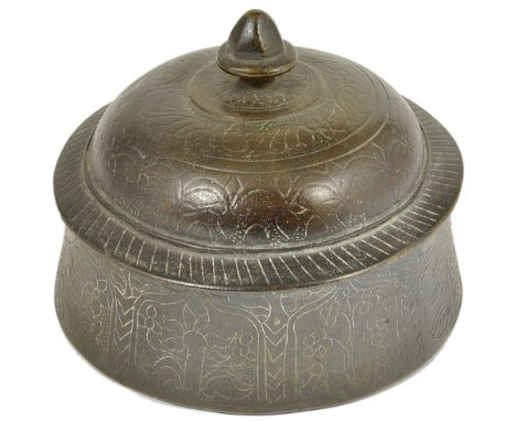A MUGHAL BRASS PAN DAN, NORTHERN INDIA, 18TH CENTURY of flared cylindrical form, the domed lid with bud finial, the exterior 